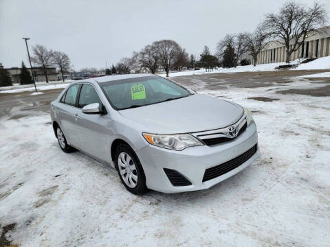 2014 Toyota Camry for sale at Fleet Automotive LLC in Maplewood MN