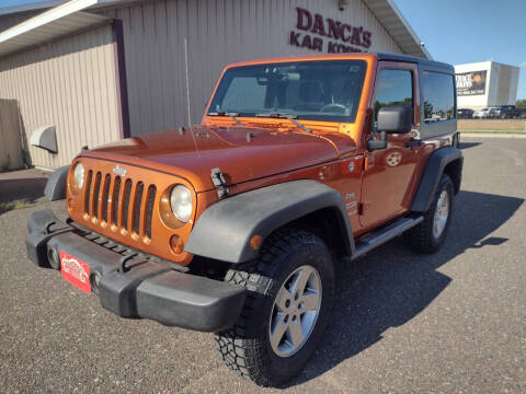 2011 Jeep Wrangler for sale at DANCA'S KAR KORRAL INC in Turtle Lake WI