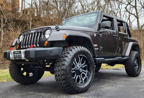 2013 Jeep Wrangler Unlimited for sale at The Motor Collection in Columbus OH