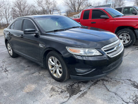 2012 Ford Taurus for sale at HEDGES USED CARS in Carleton MI