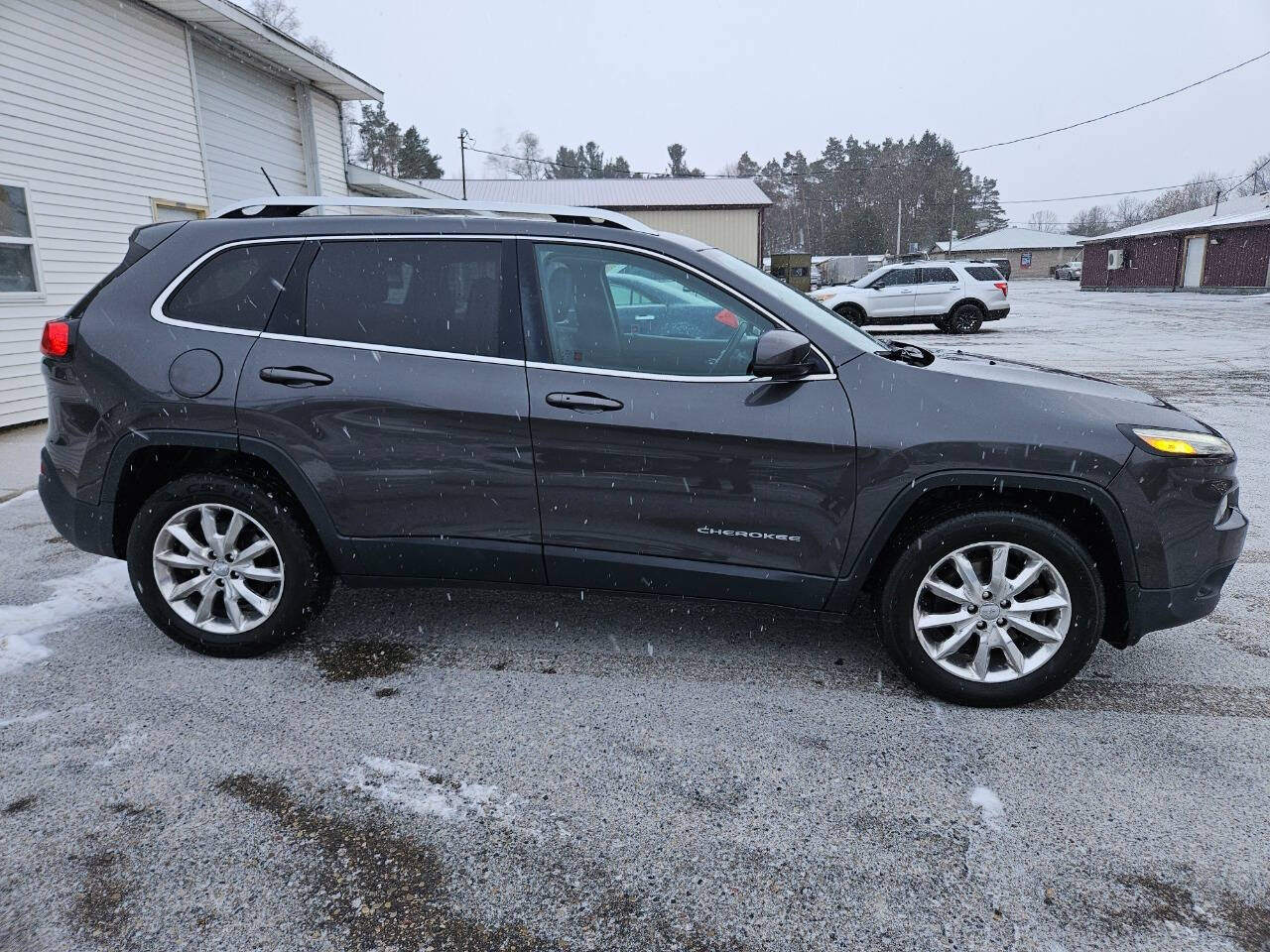 2015 Jeep Cherokee for sale at DANGO AUTO SALES in HOWARD CITY, MI