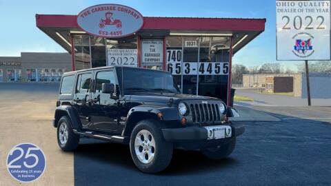2012 Jeep Wrangler Unlimited for sale at The Carriage Company in Lancaster OH