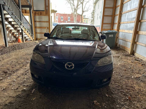 2009 Mazda MAZDA3 for sale at PUTNAM AUTO SALES INC in Marietta OH