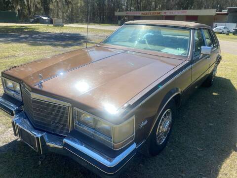 1985 Cadillac Seville for sale at KMC Auto Sales in Jacksonville FL