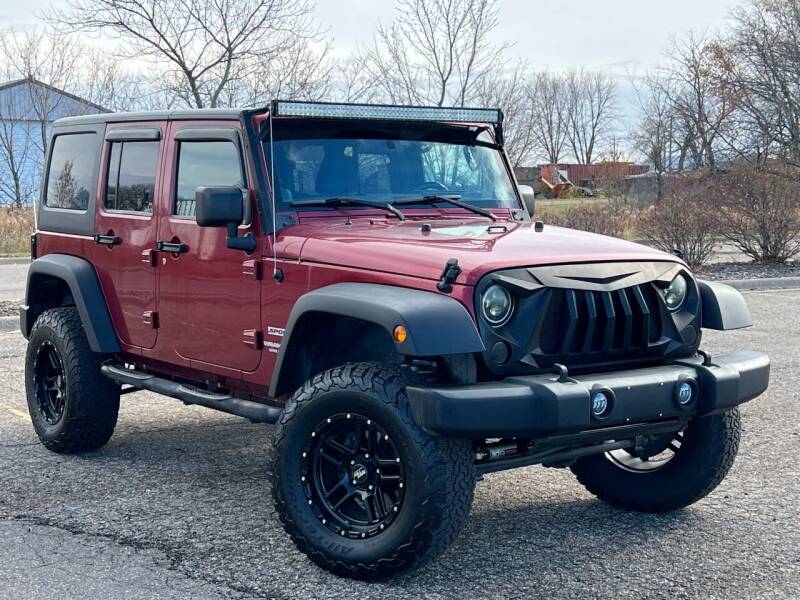 2011 Jeep Wrangler Unlimited for sale at Direct Auto Sales LLC in Osseo MN