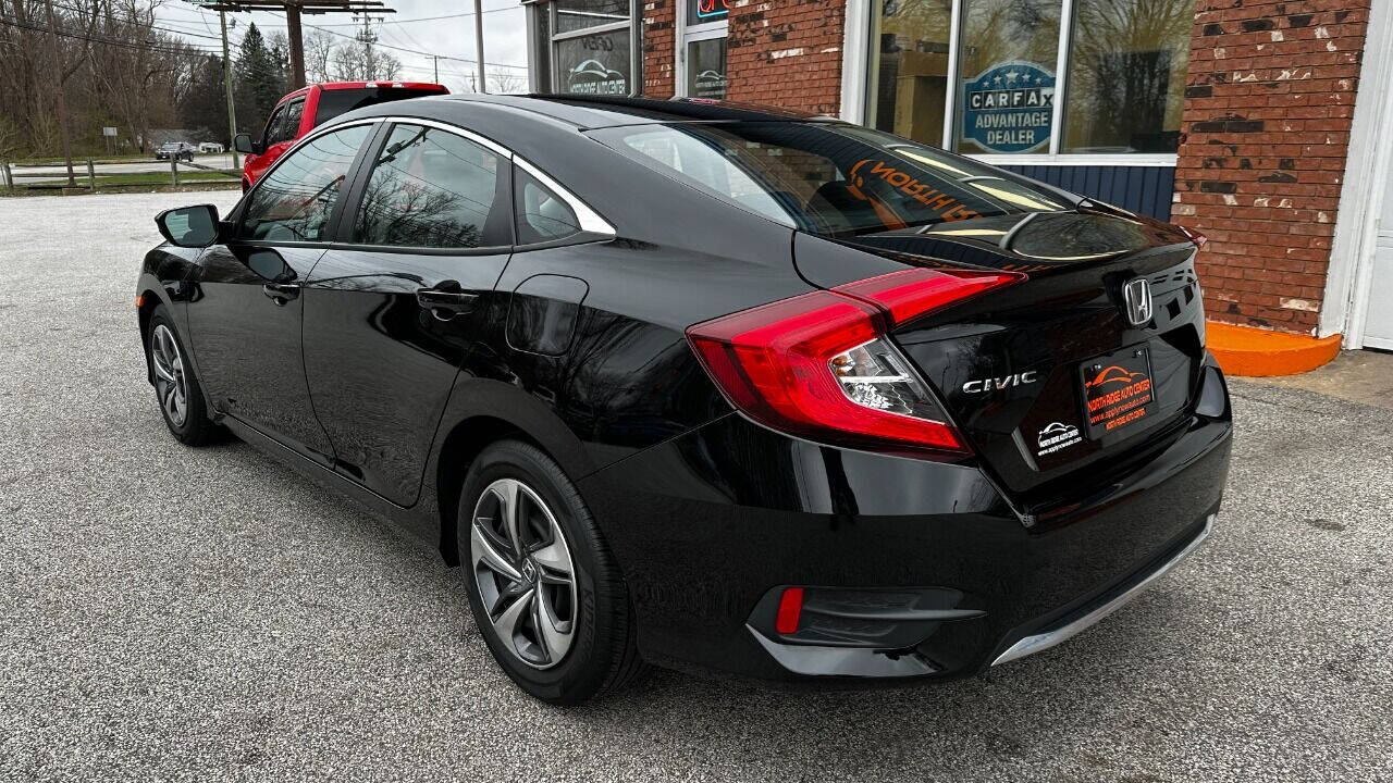 2021 Honda Civic for sale at North Ridge Auto Center LLC in Madison, OH