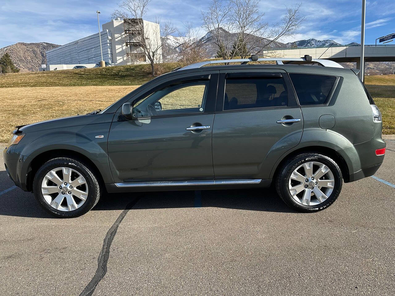 2009 Mitsubishi Outlander for sale at DRIVE N BUY AUTO SALES in OGDEN, UT