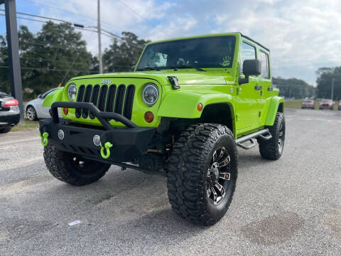 2013 Jeep Wrangler Unlimited for sale at Select Auto Group in Mobile AL