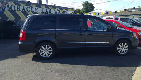 2014 Chrysler Town and Country for sale at MIRACLE AUTO SALES in Cranston RI