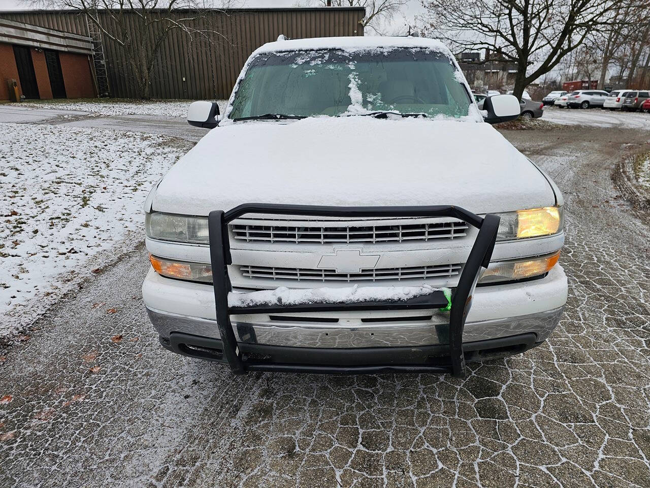 2003 Chevrolet Suburban for sale at WAGNER AUTO MART LLC in Ann Arbor, MI