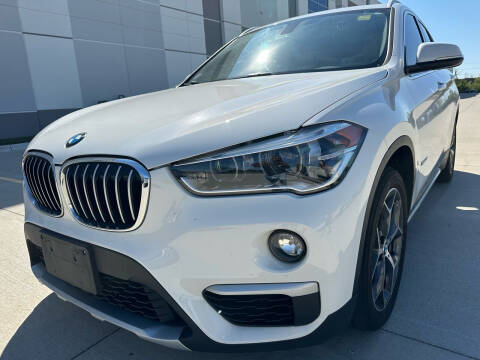 2016 BMW X1 for sale at ELMHURST  CAR CENTER in Elmhurst IL