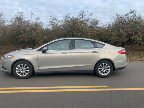 2015 Ford Fusion for sale at M AND S CAR SALES LLC in Independence OR