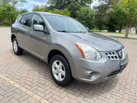 2013 Nissan Rogue for sale at PFA Autos in Union City GA