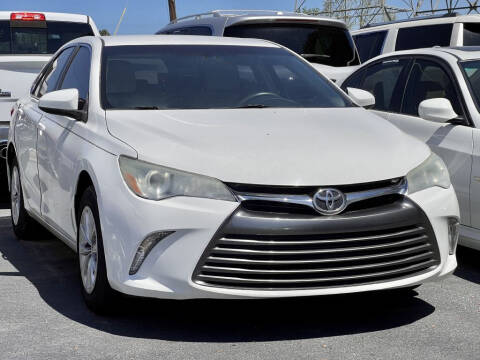 2015 Toyota Camry for sale at Atlanta Unique Auto Sales in Norcross GA