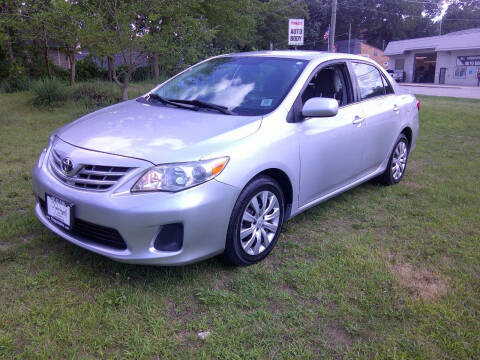 2013 Toyota Corolla for sale at Triangle Auto Sales in Elgin IL