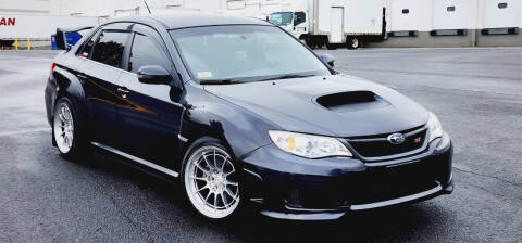 2012 Subaru Impreza for sale at BOOST MOTORS LLC in Sterling VA