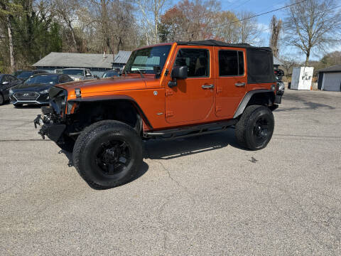 2011 Jeep Wrangler Unlimited for sale at Adairsville Auto Mart in Plainville GA