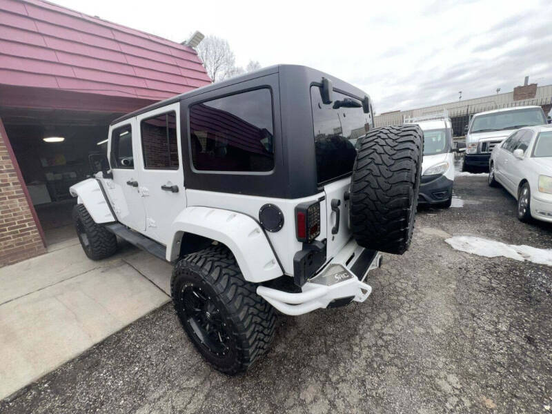 Used 2015 Jeep Wrangler Unlimited Sahara with VIN 1C4BJWEG0FL742713 for sale in Detroit, MI