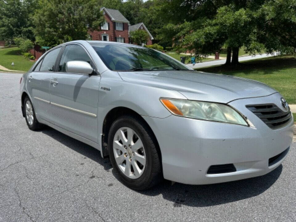 2007 Toyota Camry Hybrid for sale at SHURE AUTO SALES in Snellville, GA