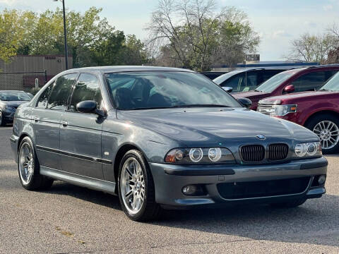 Silver BMW E39 Parked Next to Road