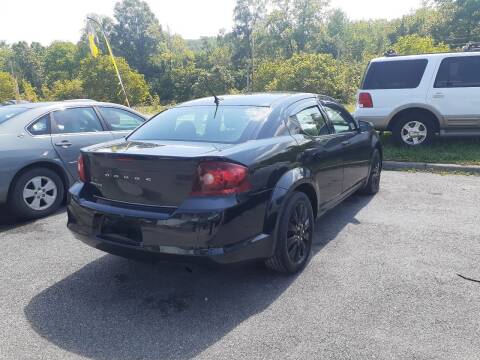 2012 Dodge Avenger for sale at LEE'S USED CARS INC in Ashland KY