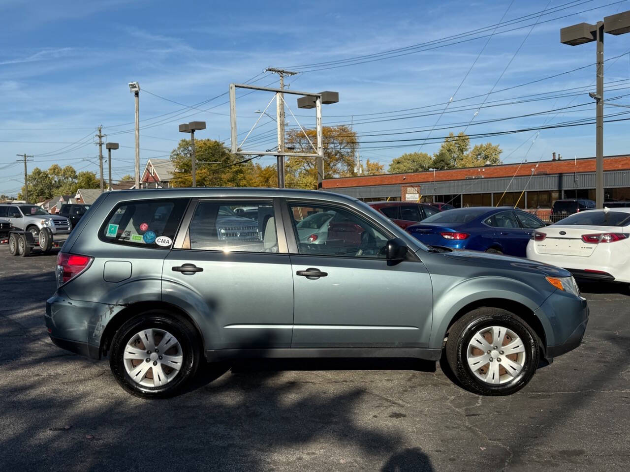 2009 Subaru Forester for sale at AVS AUTO GROUP LLC in CLEVELAND, OH