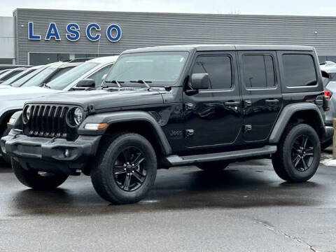 2021 Jeep Wrangler Unlimited for sale at LASCO FORD in Fenton MI