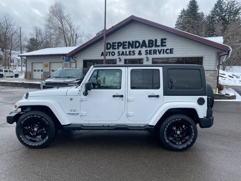 2016 Jeep Wrangler Unlimited for sale at Dependable Auto Sales and Service in Binghamton NY
