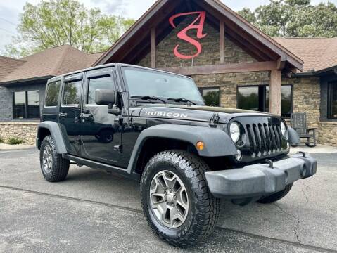 2016 Jeep Wrangler Unlimited for sale at Auto Solutions in Maryville TN