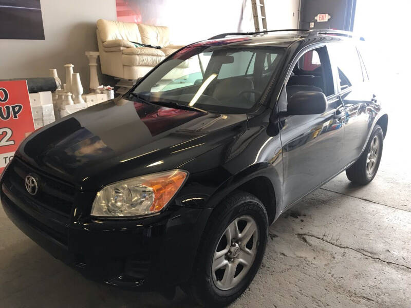 2011 Toyota RAV4 for sale at BEACH AUTO GROUP LLC in Bunnell FL