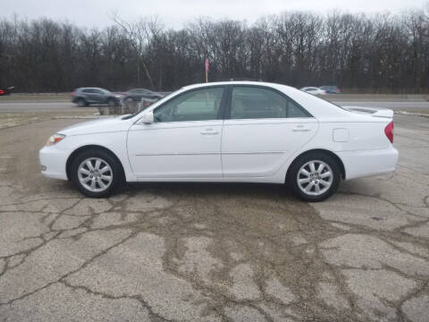 2003 Toyota Camry for sale at NEW RIDE INC in Evanston IL