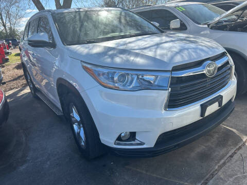 2014 Toyota Highlander for sale at Memo's Auto Sales in Houston TX