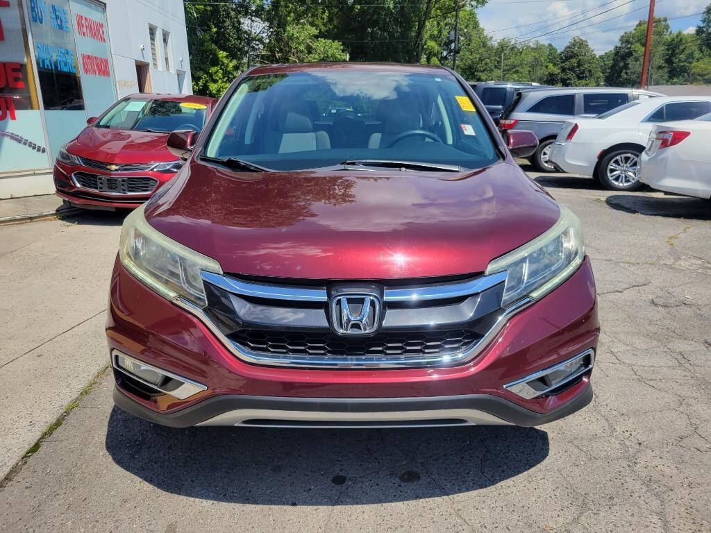 2016 Honda CR-V for sale at DAGO'S AUTO SALES LLC in Dalton, GA