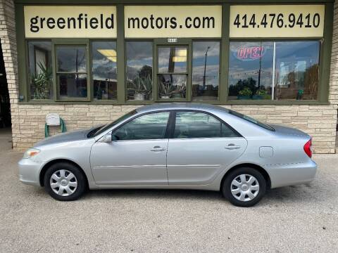 2004 Toyota Camry for sale at GREENFIELD MOTORS in Milwaukee WI