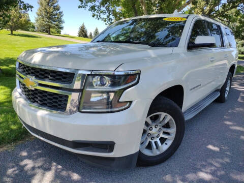 2015 Chevrolet Suburban for sale at BELOW BOOK AUTO SALES in Idaho Falls ID