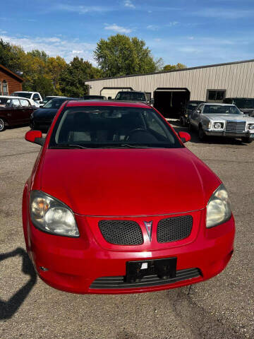 2009 Pontiac G5 for sale at COUNTRYSIDE AUTO INC in Austin MN
