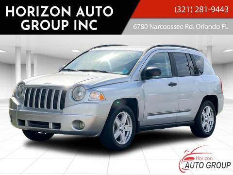 2009 Jeep Compass for sale at HORIZON AUTO GROUP INC in Orlando FL
