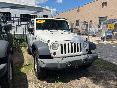 2009 Jeep Wrangler for sale at L & B Auto Sales & Service in West Islip NY