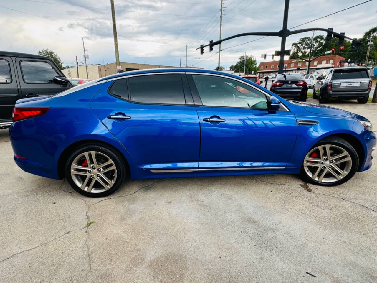 2013 Kia Optima for sale at AUTO LUX INC in Marietta, GA