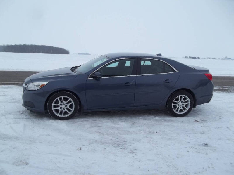 2014 Chevrolet Malibu for sale at Howe's Auto Sales in Grelton OH