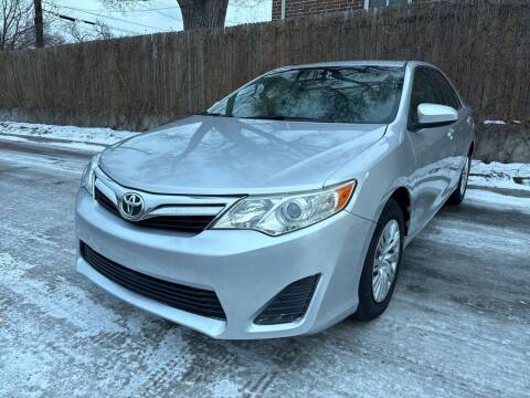 2013 Toyota Camry for sale at Friends Auto Sales in Denver CO