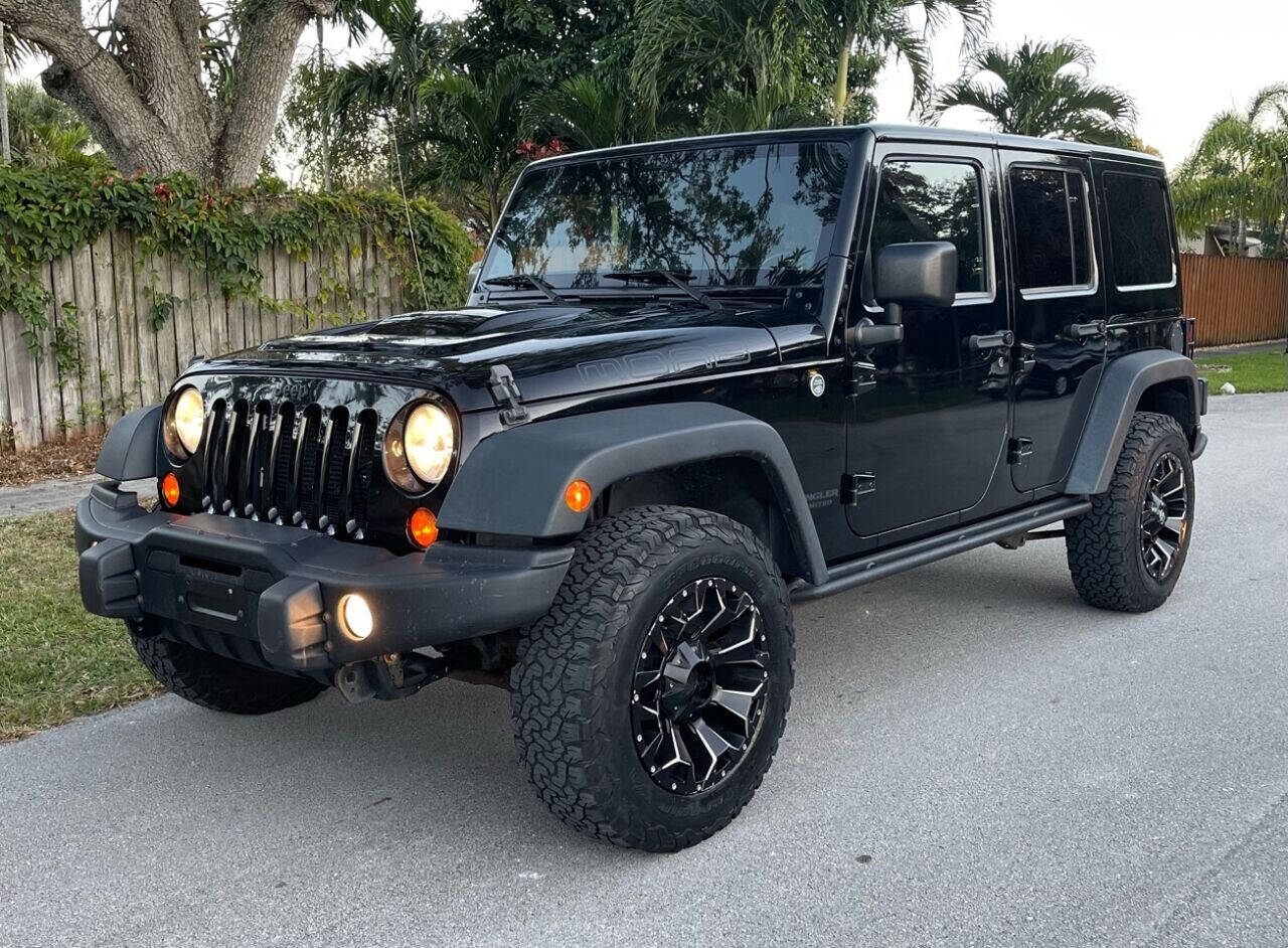 2013 Jeep Wrangler Unlimited  - $18,255