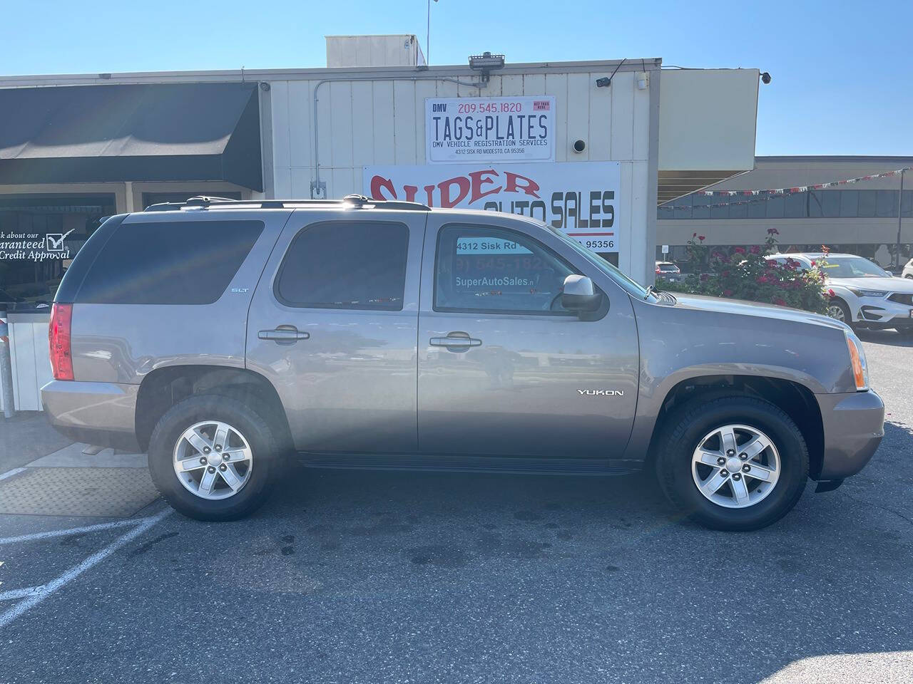 2014 GMC Yukon for sale at Super Auto Sales Modesto in Modesto, CA