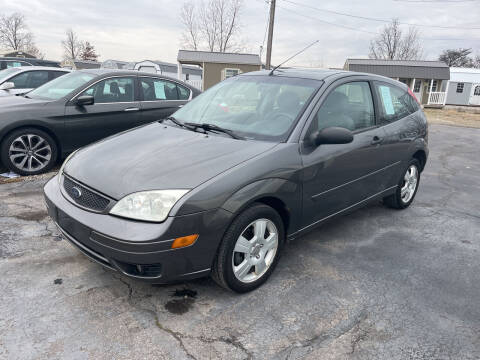 2007 Ford Focus for sale at HEDGES USED CARS in Carleton MI