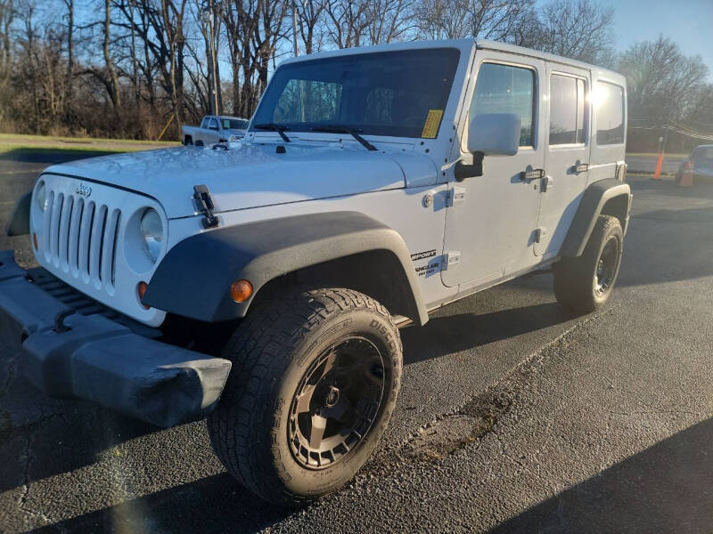 2012 Jeep Wrangler Unlimited for sale at Germantown Auto Sales in Carlisle OH