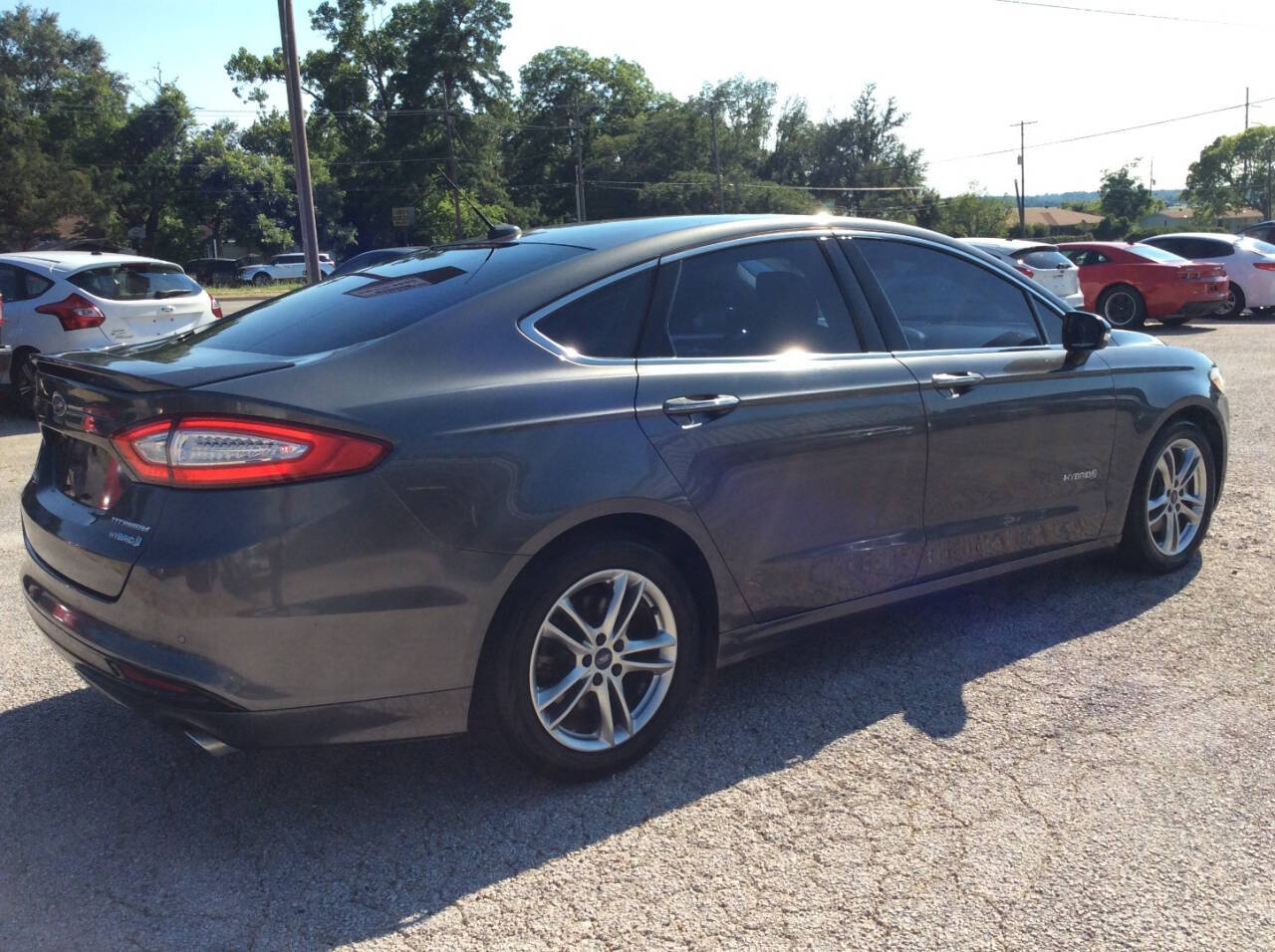 2015 Ford Fusion Hybrid for sale at SPRINGTIME MOTORS in Huntsville, TX