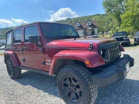 2012 Jeep Wrangler Unlimited for sale at Ron Motor Inc. in Wantage NJ