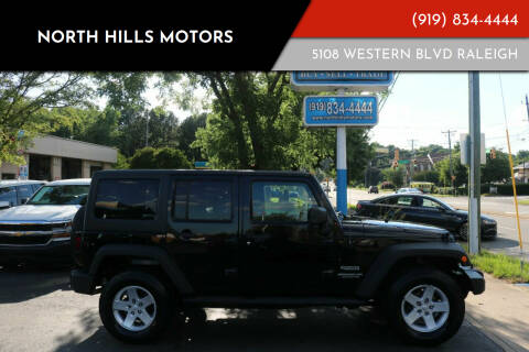 2013 Jeep Wrangler Unlimited for sale at NORTH HILLS MOTORS in Raleigh NC
