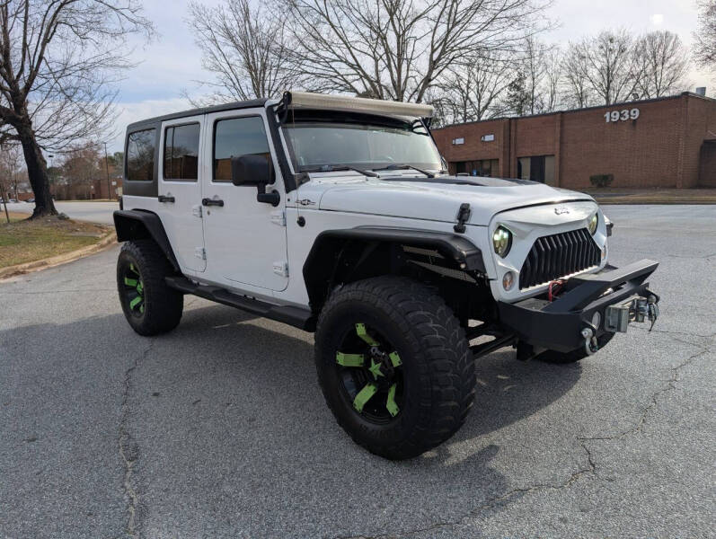 2014 Jeep Wrangler Unlimited for sale at United Luxury Motors in Stone Mountain GA