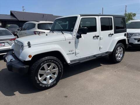 2018 Jeep Wrangler JK Unlimited for sale at HUFF AUTO GROUP in Jackson MI